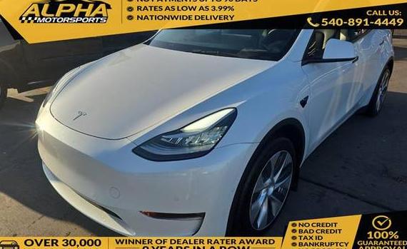 TESLA MODEL Y 2021 5YJYGAEE6MF302425 image
